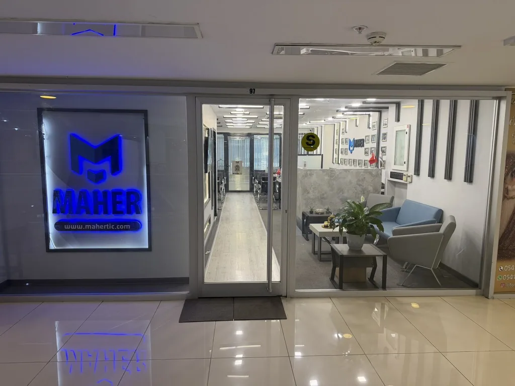The office entrance and its illuminated Maher sign