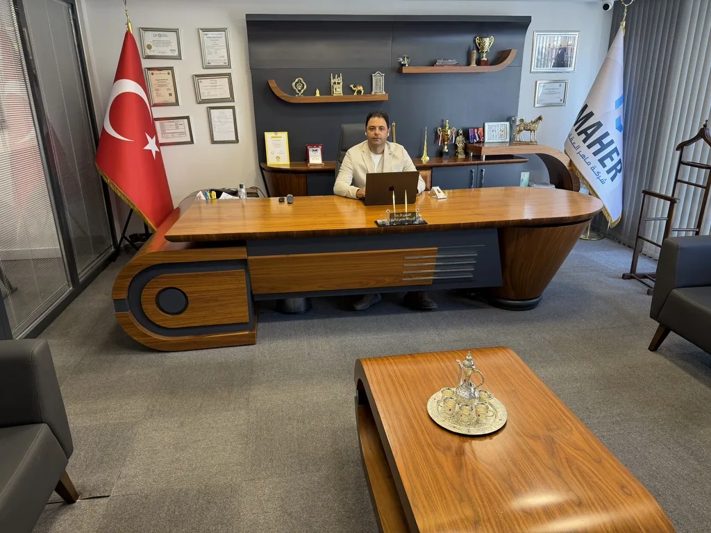 The general manager at his desk in the executive office